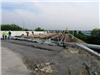 Crews work on the form work and rebar for the new concrete deck on the original Bypass bridge