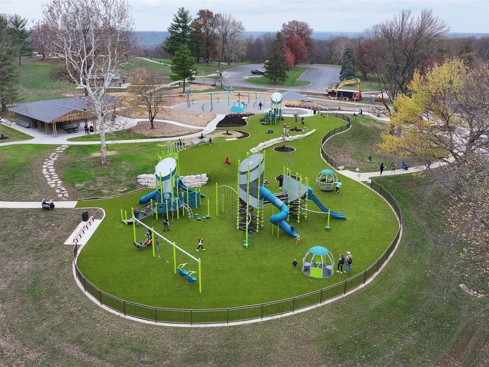 Aerial view of completed playground with children playing