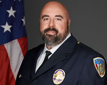 Major Michael Woodall,  Badge # 118