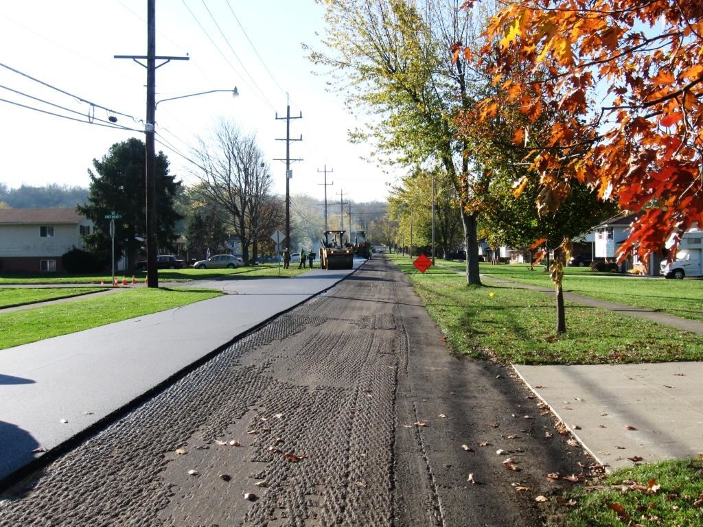 The intermediate course goes on after milling the old road and widened shoulders