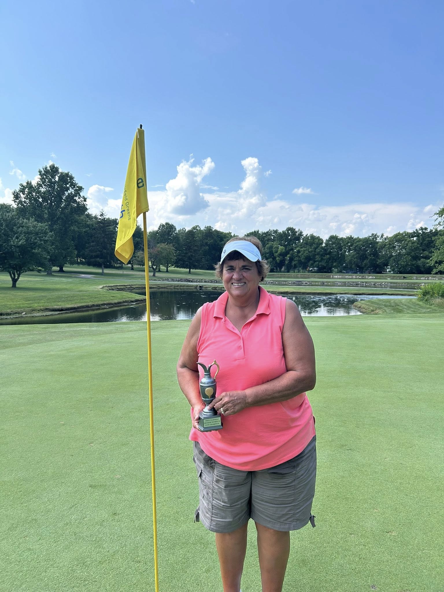 Peggy Kelley, 2025 Fairfield Women’s Senior Champion, holding trophy.