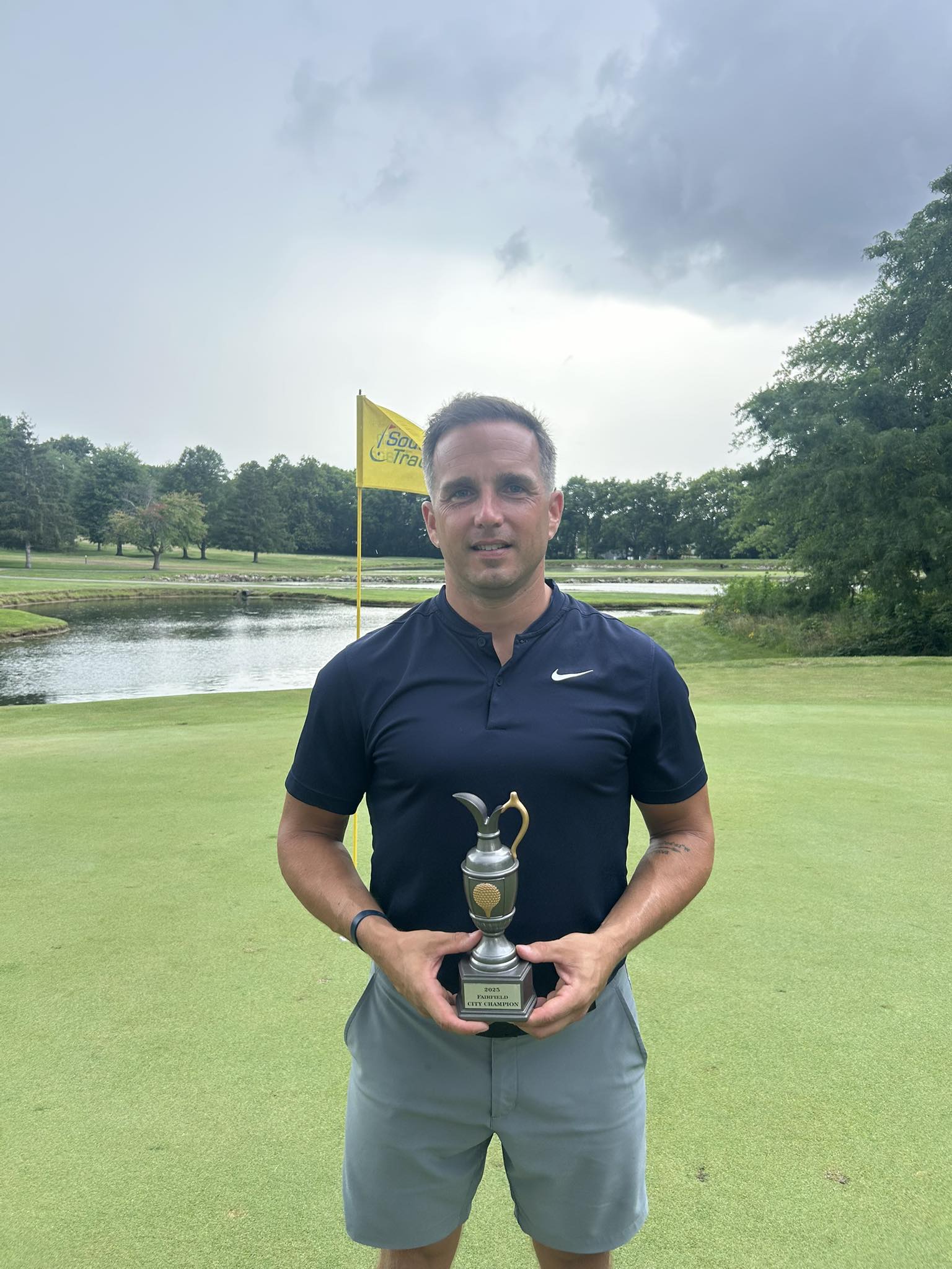 Jeff Sullivan, 2025 Fairfield City Stroke Play Champion, holding trophy.